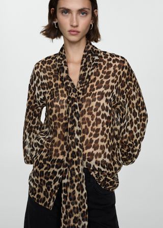 I'm a Fashion Editor: 8 Trends I'm Buying for Fall and 8 I'm Skipping Chic Leopard Print Winter Tops, Leopard Print Trend 2024, Leopard Print Fall 2024, Fall Jacket Trends, Collarless Leather Jacket, Chic Long Sleeve Leopard Print Cardigan, Baggy Sweaters, Fall Leopard Print Button-up Blouse, Matching Sweaters