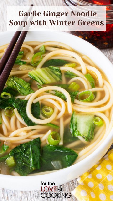 This healthy and aromatic garlic ginger noodle soup with winter greens is on the table in 30 minutes and is perfect for the cold and flu season!     #recipes #soup #noodlesoup #recipe #gingergarlic #bokchoy #spinach #vegetarianrecipes #soupseason