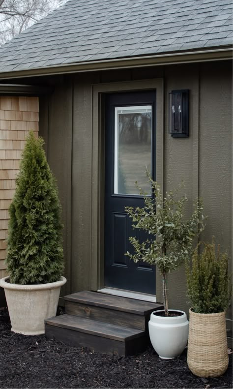 Exterior Planters Curb Appeal, Sw Muddled Basil, Sw Muddled Basil Exterior, Green Cabin Exterior, Muddled Basil Sherwin Williams Exterior, Back Door Design, Siding House Exterior, Urban Bronze Exterior House, Dark Green Exterior House