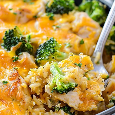 Dive into comfort with this Creamy Broccoli Cheddar Chicken Casserole! It's packed with tender chicken, fresh broccoli, and loads of melty cheddar cheese, all nestled in a creamy rice base. Perfect for a cozy family dinner, it's easy to make and even easier to love. Ready in just an hour, it's ideal for busy weeknights. Want to make dinner unforgettable? Pin this recipe now and give it a try tonight! Chicken And Cheese Casserole Recipes, Broccoli And Cheddar Casserole, Easy Chicken Casserole Recipes One Dish Broccoli Rice, Chicken Brocolli Cheddar Bake, Chicken Tenders And Broccoli Recipes, Broccoli Rice Cheese Chicken Casserole, Chicken Cheddar Broccoli Casserole, Chicken Rice Broccoli Casserole Bake, Cheese Chicken Broccoli Casserole