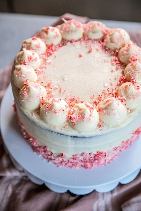 The ultimate Christmas Cake! This Chocolate Candy Cane Cake is a soft and sweet chocolate cake frosted with a creamy peppermint frosting and topped with crushed candy canes. It’s the perfect show-stopping dessert for the holidays. Candy Cane Cake Recipe, Candy Cane Cake, Peppermint Frosting, Chocolate Cake Frosting, Sweet Chocolate Cake, Homemade Eggnog, Chocolate Layer Cake, Cutout Sugar Cookies, Ultimate Christmas