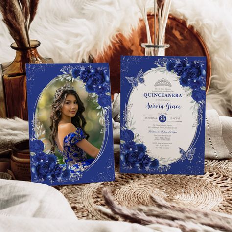 This beautiful Quinceañera invitation is adorned with enchanting royal blue flowers, sparkling butterflies, and captivating faux silver lettering, creating a truly majestic and memorable design. Symbolizing the transition from childhood to womanhood with grace and style, it is an invitation that radiates elegance, inviting loved ones to share in the joy and excitement of this significant milestone. Dark Blue Quinceanera Invitations, Royal Blue And Silver Quince Invitations, Royal Blue Invitations Quinceanera, Royal Blue With Silver Quinceanera Theme, Blue Quinceanera Theme Ideas, Quince Decorations Royal Blue And Gold, Royal Blue Quince Invitations, Royal Blue Invitations, Dark Blue Quinceanera Theme