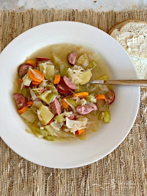 Polish Sauerkraut Soup (Kapusniak) - A family favorite for genertations! Creamy German Sausage Potato And Sauerkraut Soup, Saurkraut Soup Polish, Polish Sauerkraut Soup, Sour Kraut Soup, Kapusniak Soup, Polish Sauerkraut, Sour Kraut, Sauerkraut Soup, Soup Appetizers