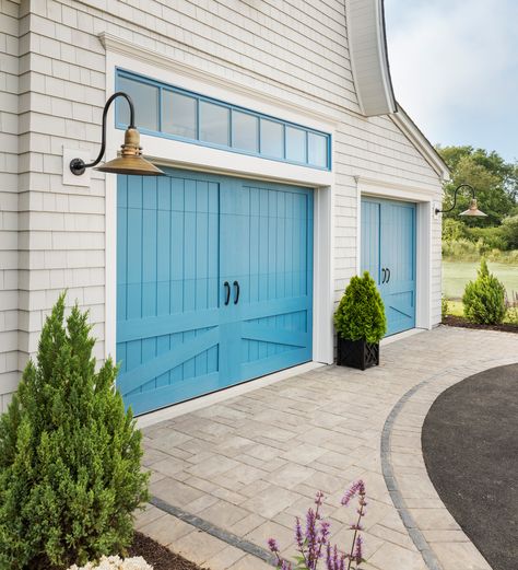 Watercolor Blue faux wood carriage house garage doors by Clopay and two-tone pavers by Unilock make a grand statement. Blue Garage, Carriage House Garage Doors, Garage Door House, Front Door Color, Carriage House Garage, Garage Door Types, Garage Door Makeover, Wood Garage Doors, Carriage Doors