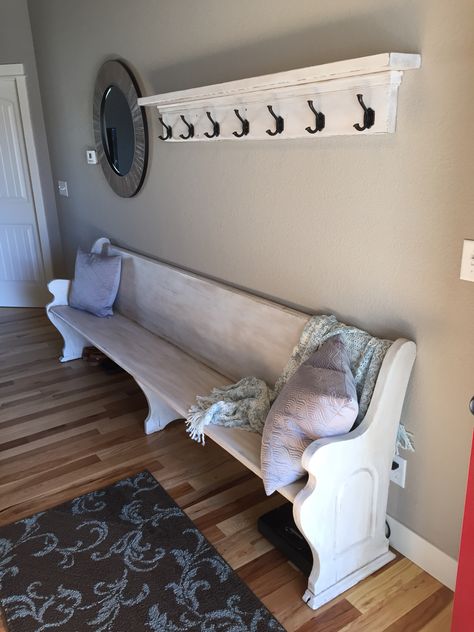 Refinished church pew with custom coat rack to match. Perfect for a long entryway. Long Entryway, Deacons Bench, Church Pew Bench, Remodeling On A Budget, Small Basement Remodeling, Entryway Coat Rack, Basement Plans, Basement Storage, Church Pew