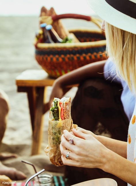 Woman eating a sandwich at a beach picnic | free image by rawpixel.com / Edgar Castrejon Breakfast On The Beach, Woman Eating, Nutrition Logo, Nutrition Course, Nutrition Drinks, Food Lion, Nutrition Education, Pinterest Recipes, Beach Picnic