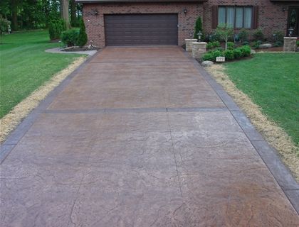 this seems a bit much, but...Straight, Brown, Stamped, Borders, Bands  Floor Logos and More  J Concrete  Uniontown, OH Painted Driveway, Stamped Concrete Patterns, Stamped Concrete Driveway, Modern Driveway, Wood Walkway, Concrete Patio Designs, Outdoor Walkway, Outdoor Fireplace Patio, Shelter Design