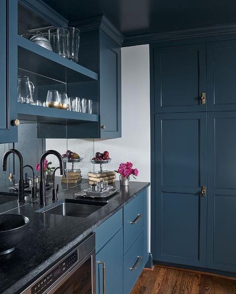 15 Cabinet Colors That Go With Black Granite Countertops | Hunker Black Gray Granite Countertops, Blue Kitchen Cabinets With Black Countertops, Kitchen Blue Cabinets Black Countertop, Black Countertop Blue Cabinets, Blue Cabinets Granite Countertops, Black Countertops Blue Cabinets, Blue Cabinets With Granite Countertops, Blue Cabinets With Black Countertops, Cabinet Colors With Dark Countertops