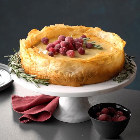 Baklava Cheesecake Recipe -With sugared cranberries and rosemary sprigs, my unique cheesecake makes a grand display for office parties and other special events. —Aryanna Gamble, New Orleans, Louisiana Christmas Cheesecakes, Cheesecake Baklava, Fall Cheesecake, Christmas Cheesecake Recipes, Baklava Cheesecake, Winter Dessert, Authentic Mexican Recipes, Christmas Cheesecake, Ricotta Cheesecake