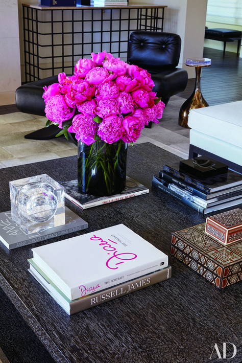 Stylish Celebrity Coffee Tables from Patrick Dempsey, Chrissy Teigen, and Naomi Watts Photos | Architectural Digest Chanel Coffee Table Book, Centerpiece For Dining Room Table, Center Table Decor, Living Room Center, Coffee Table Centerpieces, Hot Pink Floral, Patrick Dempsey, Coffee Table Styling, Naomi Watts