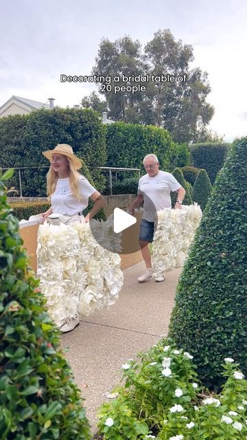 Giant Flowers Australia - Event Styling on Instagram: "This wedding had a bridal party of 20 people! The bride and groom with their many friends wanted to sit all together at the main table…so we have decorated it with our 7 meter giant flower bridal table decor. And the glamorous wedding cake by @cheskabakes_ matched the decor perfectly! 🌹🌹🌹🌹 . . #giantflowersperth #giantflowers #viralvideos #viralreels #florist #flowers #weddingideas #weddinginspiration #perthflowers #perthweddingarch #perthweddings #romanticwedding #diy #crafts #decor #weddingdress #bride #bridaltable #weddingcake" Grand Centerpieces Wedding, Wedding Main Table Decor, Wedding Decor Red Roses, Bridal Table Decor, Glamorous Wedding Cakes, Main Table Wedding, Wedding Australia, Candelabra Wedding Centerpieces, Reception Head Table