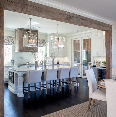 Large windows, gleaming countertops and smart lighting make this dreamy kitchen positively sparkle. Classic Kitchen, Farmhouse Style Kitchen, Open Concept Kitchen, Modern Farmhouse Kitchens, Large Kitchen, Wood Beams, Kitchen Remodeling, Smart Lighting, Dining Room Design