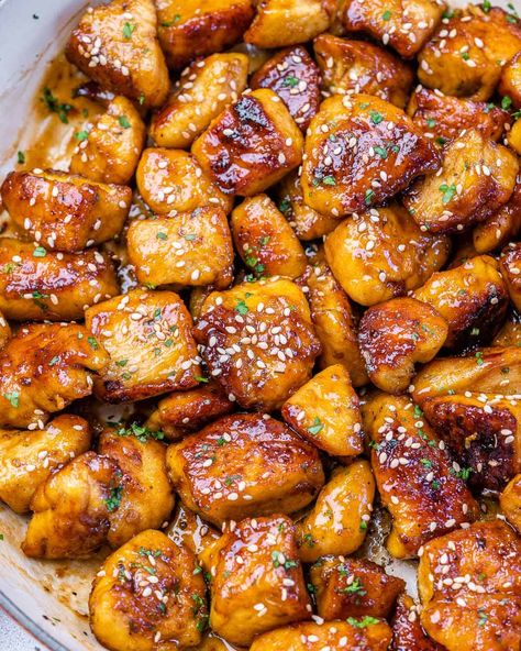 Easy to make honey garlic chicken breast bites are tender, juicy, and so flavorful. Made with simple pantry staple ingredients and ready in less than 30 minutes. Perfect to add over salads, serve over rice, or use for your meal prepping. #chickenrecipe #chickenbites #honeychicken #honeygarlicchicken Honey Chicken Breast, Honey Garlic Chicken Breast, Easy Honey Garlic Chicken, Chicken Bites Recipes, Chicken Breast Crockpot Recipes, Honey Soy Chicken, Garlic Chicken Recipe, Crockpot Chicken Breast, Fitness Meals