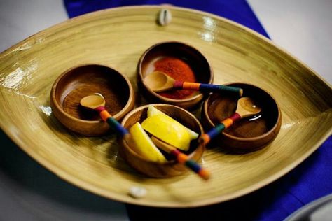 The “Tasting of the Elements”.  In a ritual from Yoruba tradition, the bride and groom taste four elements that represent different emotions within a relationship.  The tokens used in this ceremony are sour (lemon), hot (cayenne pepper), sweet (honey) and bitter (vinegar).  By tasting these elements, Femi & Latanza demonstrated their symbolic commitment to get through the seasons of life together Afrocentric Wedding, Divine Destiny, Unity Ideas, African Inspired Wedding, Wedding Ceremony Unity, Jumping The Broom, Unity Ceremony, Wedding Unity, Four Elements