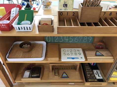 Math shelf 1 Patterning, sandpaper numerals, number cards, spindle box, 1:1 corresp., number magnet board, bead stair, hanging bead stair, mystery numbers Montessori Shelves, Montessori Shelf, Toddler Class, Teacher Office, Magnet Board, Montessori Math, Montessori Ideas, Montessori Classroom, Invitation To Play