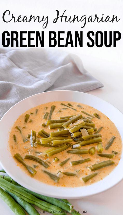 Looking for tasty green bean recipes? This creamy Hungarian green bean soup is easy to make and very delicious! #hungarianrecipes #greenbeans Creamy Green Bean Soup, Hungarian Yellow Bean Soup, German Bean Soup, European Soup Recipes, Green Bean Soup Recipes, Green Bean Soup, Green Beans Soup, Hungarian Food, Eastern European Recipes