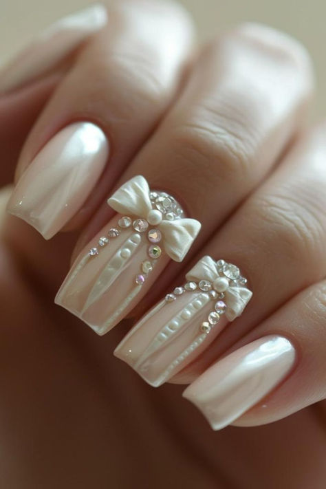 Feminine Ribbon Accent Bridal Nails Pearly White Wedding Nails, Wedding Nail Extensions, Vintage Wedding Nails For Bride, Bride Nails 2024, Country Wedding Nails For Bride, Nail Bride Wedding, Nail Wedding For Bride, Wedding Anniversary Nails Ideas, Wedding Nails For Bride Pearl