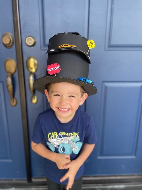 Black hat made with cars and cardboard, easy way to show your hat for hat day Crazy Hat Day Ideas For Kids, Car Hat, Crazy Hat, Crazy Hat Day, Diy Costumes Kids, Hat Day, Crazy Hats, Diy Hat, Boy Hat