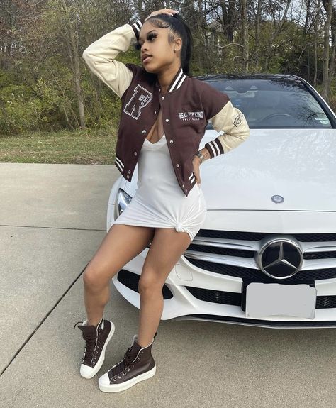 Skirts With Varsity Jackets, Fitted Brown Varsity Jacket For Fall, Varsity Jacket And Mini Skirt, Varisty Jacket Outfit Girl, Baddie Varsity Jacket Outfit, Varsity Jacket Outfit, Patches Jacket, Back To School Outfits, School Outfits