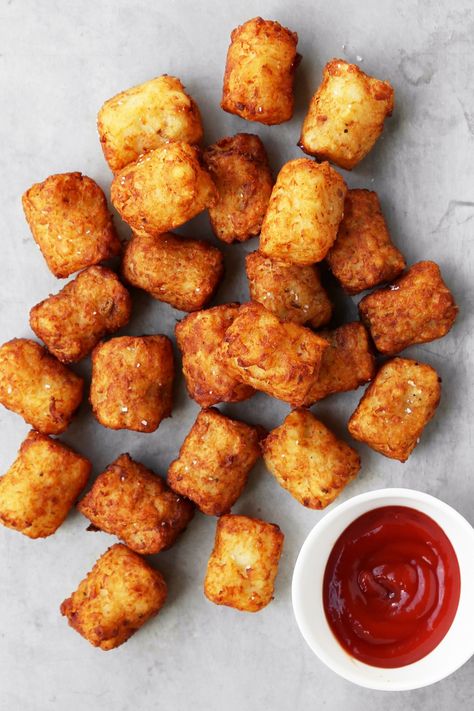 The Classics: Homemade Tater Tots are the tastiest side dish to any meal. They're easy to make and taste so much better than the frozen kind. Homemade Tater Tots, Tater Tots, Tater Tot, On The Side, Ketchup, Sauce, Bowl