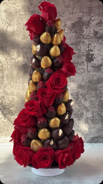 Berryccino ® on Instagram: "Why settle for ordinary when you can have extraordinary? 🍓✨ Our dark chocolate strawberry tower with red roses, gold leaves, and a touch of luxury is perfect for weddings, anniversaries, baby showers, and more. Over 70 hand-decorated strawberries in a design that’s as stunning as it is delicious. Ready to make your event unforgettable? #berryccino  #chocolatecoveredstrawberries  #strawberrytower" Chocolate Strawberry Tower, Chocolate Covered Strawberry Tower, Decorated Strawberries, Strawberry Towers, Strawberry Tower, Chocolate Covered Strawberry, Chocolate Strawberry, Gold Leaves, Chocolate Covered Strawberries