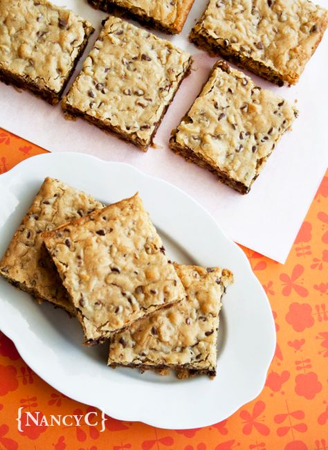 Chewy Chocolate Chip Coconut Bars | NancyC Chocolate Chip Coconut Bars, Coconut Chocolate Chip Cookies, Sweets Bar, Chocolate Chip Bars, Cookies Bars, Coconut Chocolate, Coconut Bars, Chocolate Chip Cookie Bars, Oatmeal Chocolate