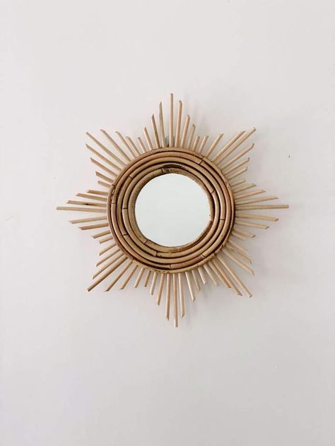 • Made with locally sourced rattan• Mirror approx. 5" diameter• Overall approx. 15" diameter• Handmade by artisans in Bali, Indonesia  This Mini "Matahari" (sun) Mirror is a splendid addition to any space. It's perfect for an entryway, bedroom, hallway, or bathroom. layer it with other natural materials for a true bohe Mirror Wall Decor Ideas, Sun Mirror, Unique Mirror, Macrame Planter, Rattan Mirror, Bathroom Decor Ideas Colors, Unique Mirrors, Entryway Bedroom, Boho Room