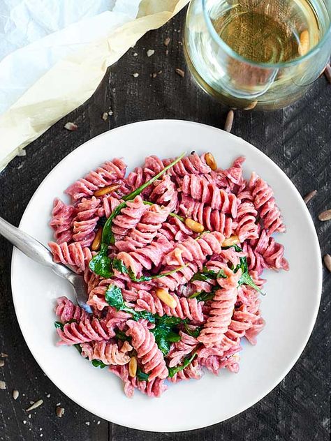 This Beet Pasta Recipe is perfect for spring! Made with fresh beet pasta, lemon juice, a touch of olive oil, arugula, goat cheese, and toasted pine nuts, this pasta is easy, fresh, and delicious! Today's post is sponsored by our new friends at Pasta Crate. Fresh pasta delivered right to my door? Um. That's a no brainer...yes please! T.G.I.F. and Happy April Fool's Day! While I don't have any tricks or jokes up my sleeve (totally not my forte), I DO have this amazing Beet Pasta Recipe to share Beets Pasta, Fusilli Recipes, Pink Recipes, Pasta Lemon, Beet Pasta, Healthier Dessert Options, Fresh Beets, Beet Hummus, Pink Food