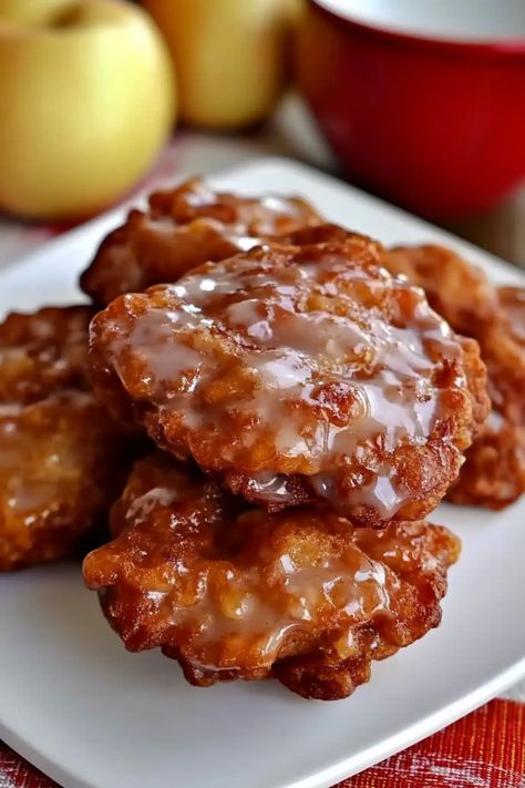 Savor our Apple Fritters: Crispy, golden, & packed with tart apples. A sweet, easy-to-make breakfast treat that's simply irresistible! The Best Apple Fritters, Rachel Cooks With Love Apple Fritters, Easy Apple Fritters Recipe Simple, Breakfast With Apples Easy, Baked Apple Fritters Oven, Apple Fritters Recipe Air Fryer, Apple Barn Apple Fritters, Breakfast With Apples, Fried Apple Fritters