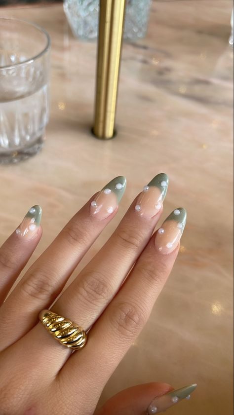 Beige And Green Nails Design, Sage Green Nails Design Almond, Almond Nails Sage Green Tips, Sage Green And Gold Nails Design, Sage Green Nails With Rhinestones, Green French Tip Nails With Pearls, Dark Green Nails With Pearls, Sage Green Pearl Nails, Sage Green Prom Nails Acrylic