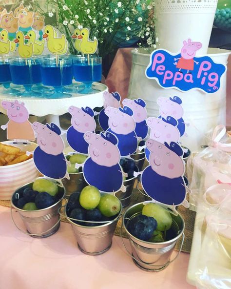 Addison's 3rd Peppa Pig Party | CatchMyParty.com Peppa Pig Birthday Party Food Ideas, George Pig Birthday Party Decorations, Peppa Pig Centerpiece Ideas, Peppa Pig Party Hats, Pig Themed Party, Pig Birthday Party Decorations, George Pig Birthday Party, Pig Birthday Decorations, Peppa Pig Birthday Party Ideas