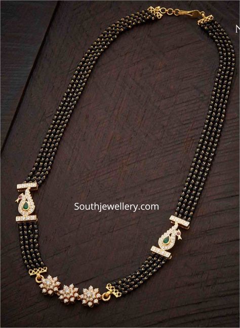 Black beads mangalsutra with diamond pendant and side brooches Latest Indian Jewellery, Mangalsutra Design, Black Beads Mangalsutra, Black Beads Mangalsutra Design, Diamond Mangalsutra, Diamond Pendants Designs, Antique Gold Jewelry Indian, Gold Jewelry Simple Necklace, Gold Mangalsutra Designs