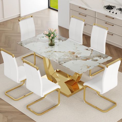 PRICES MAY VARY. 【7-Piece Dining Table Set】Elevate your dining space with our sophisticated 7-piece dining table set. Featuring a 71" faux marble glass top table and 6 waterproof PU leather chairs, this set combines elegance and practicality, perfect for family meals and entertaining guests. 【Faux Marble Dining Table】The highlight of this dining set is the 71" dining table, the top is made of tempered glass with a glossy marbled decal. The glossy finish adds a touch of luxury, while the gold U-s Gold Kitchen Table, Dining Table Glass Top, Rectangular Dining Room, Marble Dining Table Set, Faux Marble Dining Table, Rectangular Dining Room Table, Marble Top Dining Table, Marble Dining Table, Leather Chairs