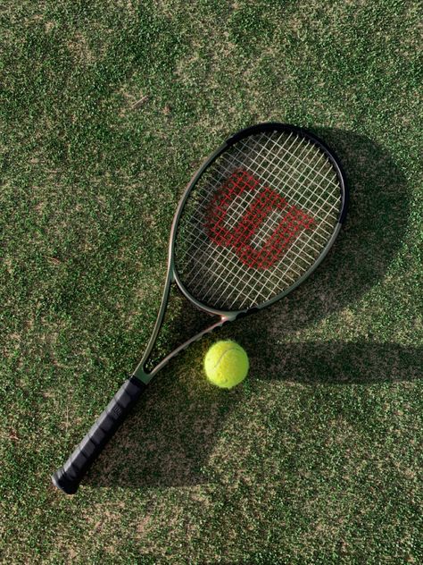 Wilson tennis racket on green tennis court Wilson Racket Tennis, Tennis Racket Aesthetic, Wilson Racket, Tennis Things, Wilson Tennis Racket, Tennis Vibe, Racket Tennis, Tennis Camp, Yearbook Photo