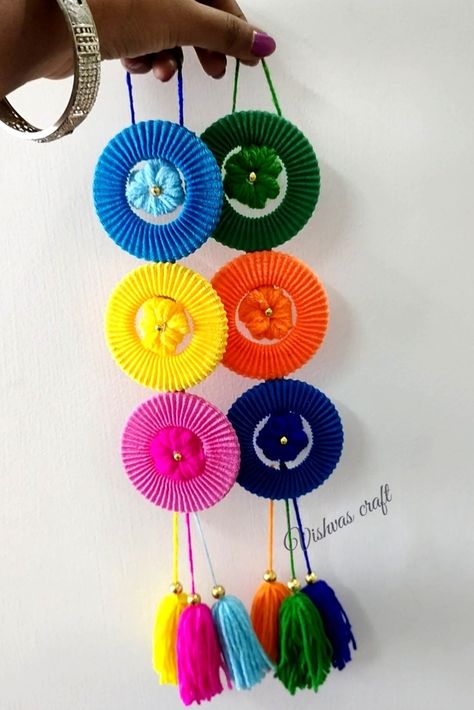 Wall hanging ideas using with waste bangles Waste Bangles Craft Ideas, Bangles Craft Ideas, Craft Ideas Wall Hanging, Bangles Craft, Waste Craft Ideas, Reuse Ideas, Woolen Flower, Woolen Craft, Lettering Art