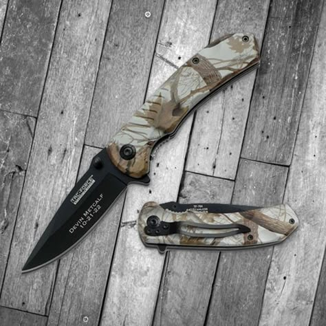 "-------------------------- PRODUCT DETAILS -------------------------- - Camo-designed pocket knife great for your outdoors-loving groomsmen. - Measures 9\" overall. - Blade: 4.5\" long. - Handle 4.5\" long - Brown camo coated nylon fiber handle with 3CR13 black stainless steel drop point blade. - Spring assisted. - Pocket clip. - Liner lock. - Finger flapper. - FREE SHIPPING on orders $35+ - RUSH ORDERS available: https://etsy.me/2XbpDlk ----------------------- PERSONALIZE IT! ----------------------- We'll engrave the blade with up to two lines of custom text (13 characters max per line). Or we can engrave the recipient's name or initials. You can also choose to receive the knife without this personalization. ----------------------------------------- TIMELINE AND RUSH ORDERS ------------- Personalized Pocket Knife, Country Things, Engraved Pocket Knives, Stanley Cups, Pretty Knives, Southern Outfits, Drop Point, Thanksgiving Nails, Groomsmen Gifts