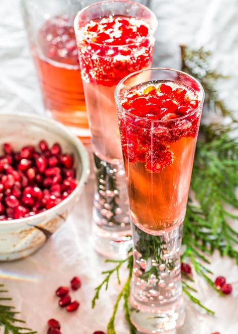 Pomegranate Elderflower Spritzers - Jo Cooks Pomegranate Cocktail Recipes, Poinsettia Cocktail, Classy Cocktails, Elderflower Cocktail, Pomegranate Cocktails, New Year's Drinks, New Years Cocktails, Beverage Ideas, Champagne Recipes Cocktails