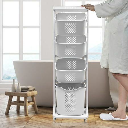 This multi-functional rolling laundry hamper cart is made of high-quality PP material, which is very durable and sturdy, no odor and not easy to deform. Universal roller design, equipped with 4 360 rotatable pulleys, can be moved freely and easy to operate and install. The storage baskets are designed with carrying handles on both sides for stable lifting, making it more convenient and easy to use. They are versatile and can be layered for storage and classification. Suitable for all indoor places, bedroom, bathroom, kitchen, study. It can perfectly organize all items. Specification: Type: Rolling Laundry Hamper Cart Material: PP material Color: White Mounting: Free Standing Features: Wheeled Size: 4-Layer cart: 17.32*12.99*55.5 in (44*33*141cm) Small basket: 14.57*11.42*7.87 in (37*29*20c Family Laundry System Baskets, Vertical Laundry Basket Storage, Laundry Bin Storage, Laundry Basket Under Washer And Dryer, Dorm Laundry Hamper, Laundry Basket Ideas, Stackable Laundry Baskets, Clothes Basket Storage, Laundry Room Storage Solutions