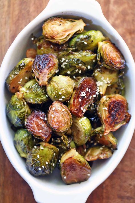 Asian Brussels sprouts with soy sauce and honey become wonderfully caramelized when baked. Recipes Brussel Sprouts, Asian Brussel Sprouts, Brussel Sprout Recipes Roasted, Asian Vegetables, Sprout Recipes, Brussels Sprouts Recipe, Healthy Food Blogs, Cooked Vegetables, Healthy Side Dishes