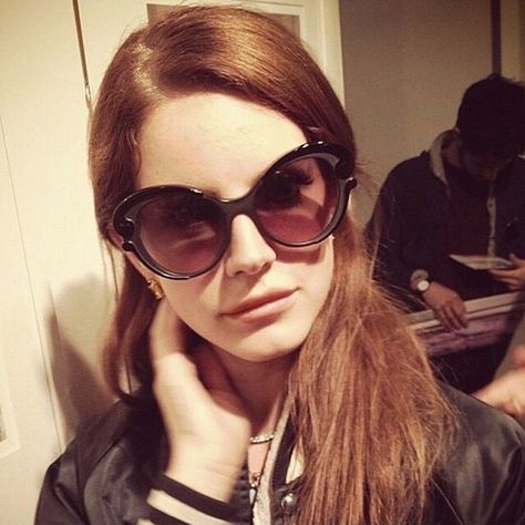 Nina🍒 on Instagram: “I’ve always seen people saying how “fake” Lana was during the Born To Die era and how she created a persona to get successful, and this…” Lana Del Rey Selfie, Lana Del Rey, Persona, Sunglasses, Tumblr, Red, Hair, On Instagram