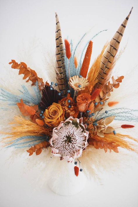 Dried flower bouquet with terracotta and teal dried flowers, dried king protea, pampas grass, terracotta roses. Perfect for the bride looking for a non-traditional and eye-catching bouquet Bouquet With Feathers, Teal Bouquet, Bouquet With Roses, Boho Bridal Bouquet, Fall Wedding Bouquet, Protea Bouquet, Feather Bouquet, King Protea, Boho Wedding Bouquet