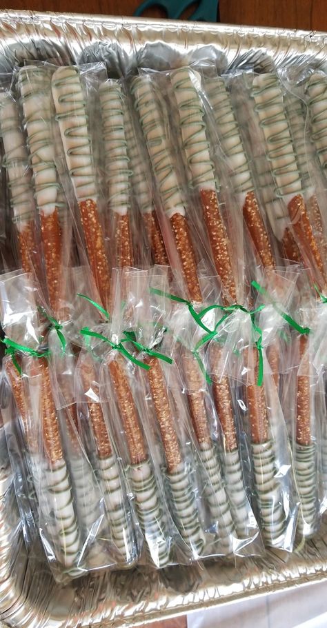 Chocolate dipped pretzels with forest green drizzle Dipped Pretzel Rods, Dipped Pretzels, Chocolate Dipped Pretzels, Pretzel Dip, Pretzel Rods, Green Baby Shower, Chocolate Pretzels, Heaven Sent, Chocolate Dipped