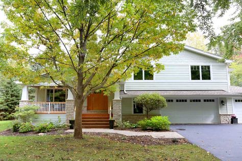 Exterior Makeover and Home Addition in Palatine split level with added porch Adding A Front Porch To A Split Level, Remodeled Split Level Homes, Split Level Floor Plans 4 Bedroom, Split Level Front Porch, Split Level Addition, Split Level House Exterior, Split Level Remodel Exterior, Split Level Floor Plans, Split Level Exterior