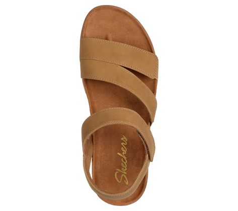 Bring sensibly modern design to your warm weather look wearing Skechers Lifted Comfort. Available in a variety of colors, this vegan sandal features three adjustable faux leather straps with a cork-trimmed Skechers Memory Foam footbed. | Skechers Women's Lifted Comfort Sandals | Medium Width | Skechers Memory Foam contoured comfort footbed | Crafted with 100% vegan materials | Faux leather adjustable straps | Contoured footbed with cork trim | Flexible traction outsole | 3/4-inch heel height | S Comfy Sandals Walking, Best Walking Sandals, Comfortable Walking Sandals, Vegan Sandals, Women Lifting, Skechers Memory Foam, Comfy Sandals, Walking Sandals, Adventure Style