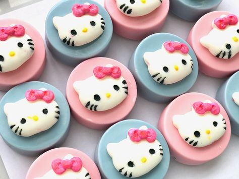 Hello Kitty Chocolate Dipped Oreos Hello Kitty Chocolate Covered Oreos, Hello Kitty Oreos, Hello Kitty Rice Crispy Treats, Hello Kitty Treats, Oreo Treats, Ladybug Cupcakes, Hello Kitty Theme Party, Snowman Cupcakes, Cat Cupcakes