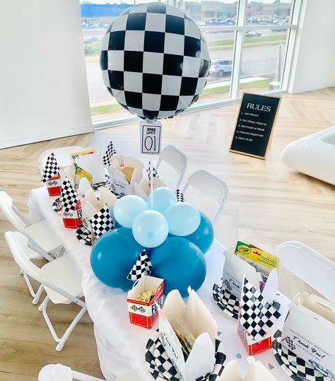 Millen is a Fast One 1st Birthday Race Car theme 🤍💙🖤 We had a blast with this “One” 😉 . . . . Event Decor (Balloons, Centerpieces:… | Instagram Race Car Party Centerpiece, Cars Centerpiece Ideas, 1st Birthday Race Car Theme, Race Car Centerpiece Ideas, Birthday Race Car Theme, Balloons Centerpieces, Car Centerpieces, Motorcycle Birthday Parties, 1st Birthday Centerpieces