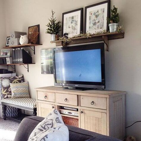 floating shelf over tv Picture Shelf Above Tv, Long Shelf Decor Living Room, Long Shelf Decor, Living Room Shelving Ideas, Above Tv Decor, Shelf Above Tv, Room Shelving Ideas, How To Decorate Around A Tv, Living Room Shelving