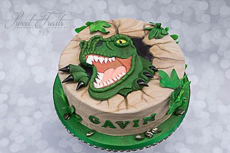 Cake was based off of NUMEROUS cakes similar to this one on the internet. I do not know the original caker who designed this cake. I’m sorry. I try to give “shout outs” whenever possible. Fondant covered the cake and I made a fondant cutout of the... Dinosaur Cake Ideas, Dino Birthday Cake, T Rex Cake, Dinosaur Birthday Cake, Dino Cake, Dinosaur Birthday Cakes, Fantasy Cake, 50th Birthday Cake, Dinosaur Cake