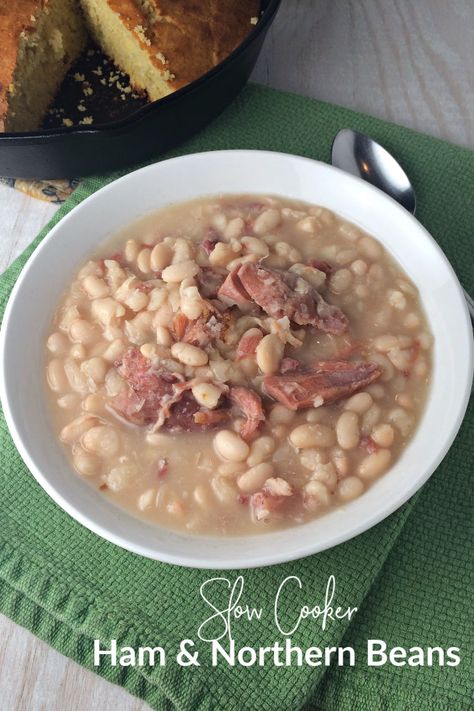 Slow Cooker Ham and Northern Beans is an all around family favorite. Comfort food doesn't get much easier. And it's a perfect way to use up left over holiday ham! Ham And Northern Beans, Beans With Ham, Crockpot Ham And Beans, Beans Recipe Crockpot, Beans And Ham, Beans And Cornbread, Slow Cooker Ham, Crockpot Ham, Holiday Ham