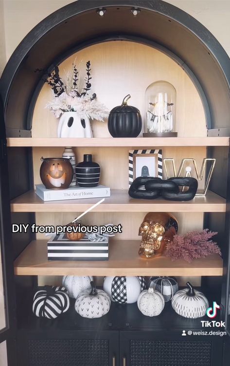 Fall decor, fall bookshelf styling, fall bookshelf decor, Halloween decor, Halloween bookshelf decor, Halloween bookshelf styling  Follow my shop @Staged2Shine on the @shop.LTK app to shop this post and get my exclusive app-only content!  #liketkit #LTKSeasonal #LTKhome @shop.ltk https://liketk.it/4RtuM Bookshelf Halloween Decor, Black Bookshelves Aesthetic, Halloween Bookshelf Decor, Fall Bookshelf Decor, Halloween Bookshelf, Fall Bookshelf, Bookshelves Aesthetic, Black Bookshelves, Witch Party